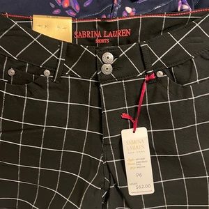 Brand new with tags black checkered shorts.